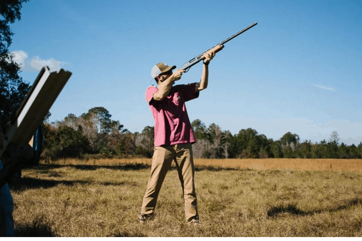 hunter holding shotgun