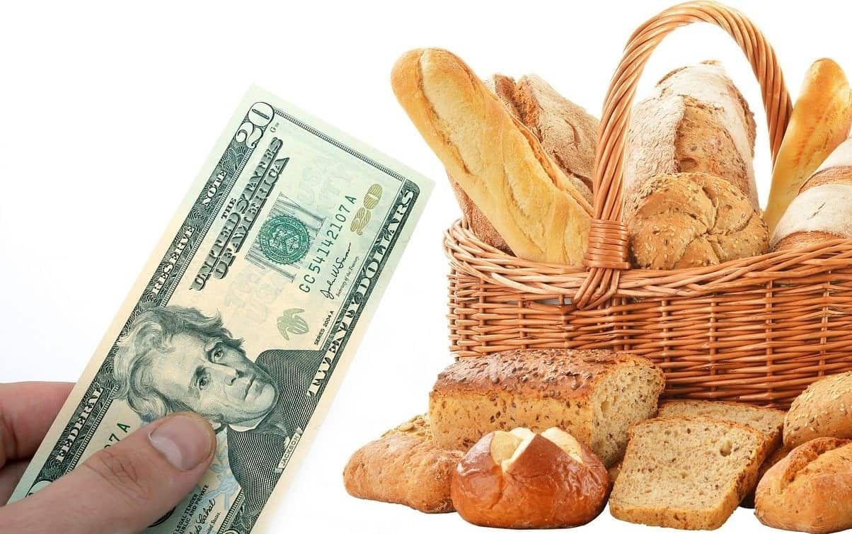 holding money bread